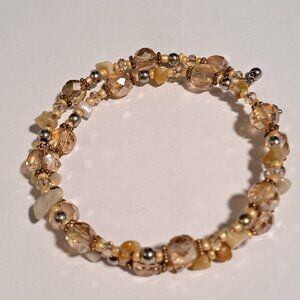 open spiral bracelet with silver tan yellow beige beads